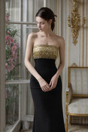Gold beaded fringe bodice detail on VOGSION black strapless fitted maxi dress