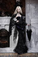 Black and purple Gothic two-piece corset and maxi skirt set, side view