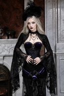 Close view of black and purple Gothic structured top with separate skirt waistband