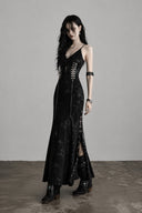 Side view of the VOGSION Iron Veil black Gothic maxi dress showing the high slit, removable silver chains and metal hardware.