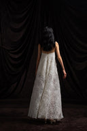 Back view of VOGSION ivory textured maxi dress