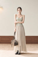 Front view of VOGSION khaki petite A-line maxi dress with fitted cotton blend bodice and flowing lined skirt
