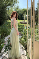 VOGSION Lemon Green pearl halter open-back maxi dress, three-quarter view