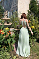 Back view of VOGSION Lemon Green open-back halter maxi dress