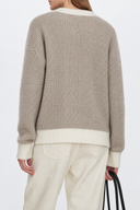 Back view of Liorine contrast-trim wool sweater showing relaxed fit, fine knit texture and ivory ribbed hem
