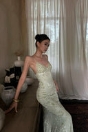 Figure-flattering VOGSION Sylvie Petite Mint Garden Maxi Dress with delicate floral jacquard and adjustable straps.