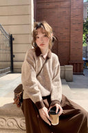 Front view of Marlowe petite wool-blend sweater with cocoa collar and cuffs, styled with a brown skirt