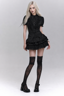 Full view of black Gothic ruffle mini outfit with pointed collar