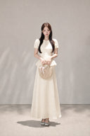 Front full-length view of the VOGSION Mirelle Apricot puff-sleeve petite faux two-piece maxi dress.