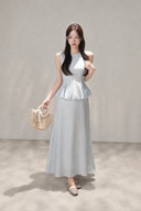Full-length view of the VOGSION Mirelle Light Blue sleeveless petite faux two-piece A-line maxi dress.