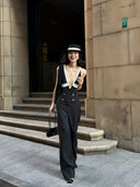 Full-length view of the VOGSION Nocturne black and white dressy pants set with high-waisted wide-leg trousers