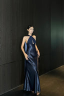 Navy blue formal halter maxi dress in a floor-length silhouette