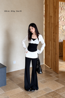 Odette petite black and white faux-layer cotton-blend top and high-waisted trousers, full-length front view; model 158 cm, 40 kg, wearing XS