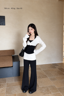 Odette cotton-blend petite matching set with crossover white neckline and contrasting black waist; model wearing XS