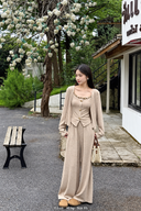 Petite model wearing an Almond beaded cotton-blend three-piece knit set with cardigan and high-waisted wide-leg pants, 153 cm and 40 kg, wearing XS