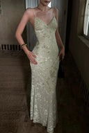 Sophisticated mint green floral wedding guest maxi dress designed to create an elegant, elongated silhouette for petite women.