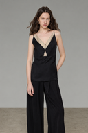 Petite-friendly black layered camisole top with matcha green contrast panel and relaxed silhouette