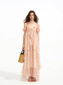 VOGSION Rosalie blush pink cascading ruffle maxi dress, full front view