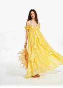 VOGSION Rosalie butter yellow cascading ruffle maxi dress in motion