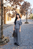 Grey petite cotton-blend three-piece knit set with rosette peplum camisole, cropped cardigan and wide-leg pants, front view
