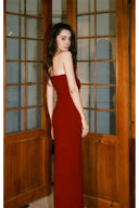 Back view of VOGSION Rosamonde strapless burgundy maxi dress with a clean fitted silhouette