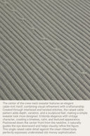 Center cable-knit motif detail on the Sélise ribbed wool sweater