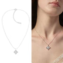 Silver tone floral CZ pendant necklace with vintage iris flower design
