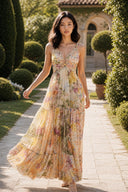 VOGSION Solenne floral summer maxi dress shown in a full-length walking view
