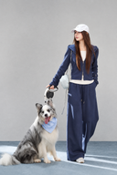 Sorelle petite navy cotton-blend matching set styled with a white top, cap and sneakers beside a dog.