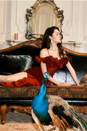 VOGSION Valentina burgundy 3D rose formal dress in a seated evening look