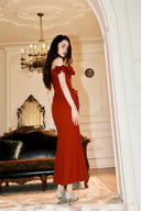 Back view of VOGSION Valentina off-shoulder burgundy maxi dress