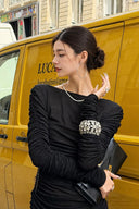 Front view of VOGSION Vespera black ruched long-sleeve H-line mini dress