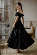 Black satin ruffle maxi dress with fitted waist and back view