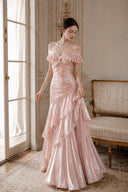 VOGSION Vivienne blush pink satin ruched off-shoulder ruffle maxi dress, front view