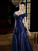 VOGSION Vivienne deep navy satin off-shoulder ruffle maxi dress, front view