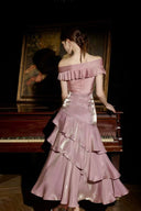 Deep pink satin off-shoulder maxi dress with back zipper and layered ruffle skirt, back view