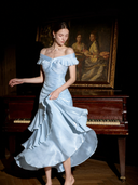 Light blue satin ruched off-shoulder formal maxi dress with cascading ruffles, front view