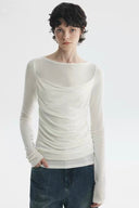  White sheer long sleeve top with soft ruching and relaxed sleeve length