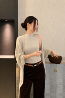 Ivory wool-blend sleeveless knit tank with matching draped cardigan